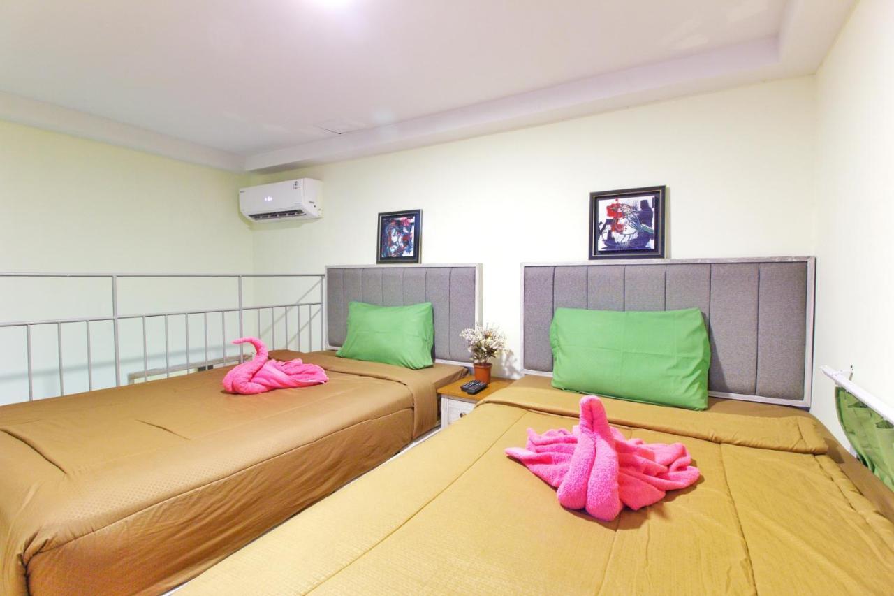Urbanest Inn House Slipi Jakarta Phòng bức ảnh